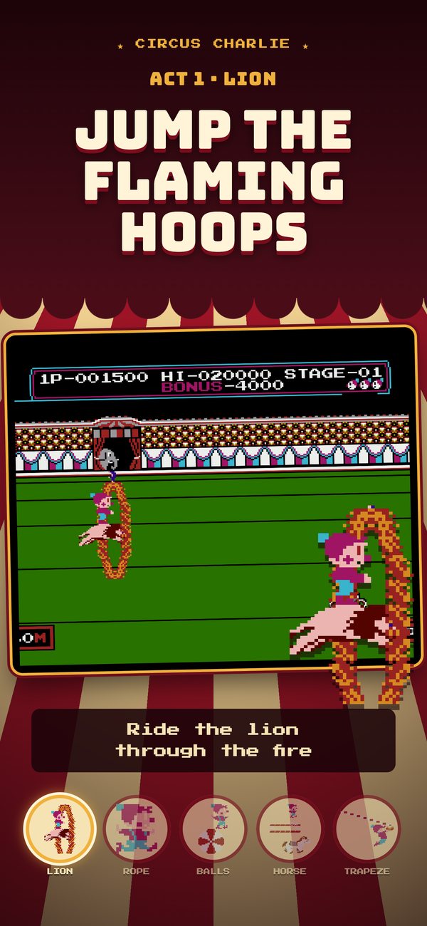 Charlie rides the lion through a flaming hoop